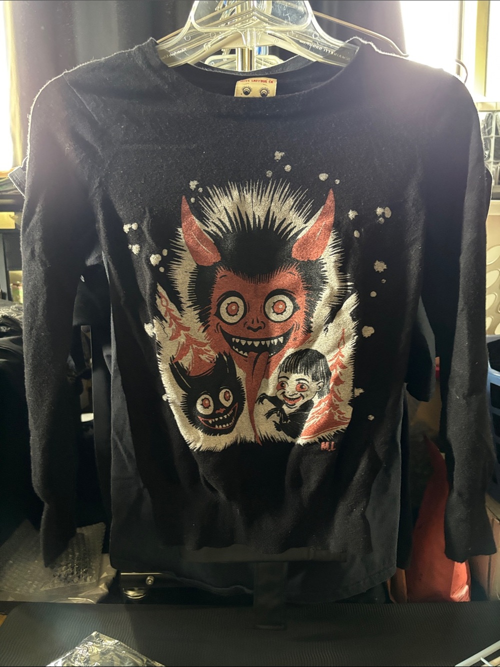 Miss Ladybug Black Long-Sleeve Graphic Knit with Red Krumpus Artwork